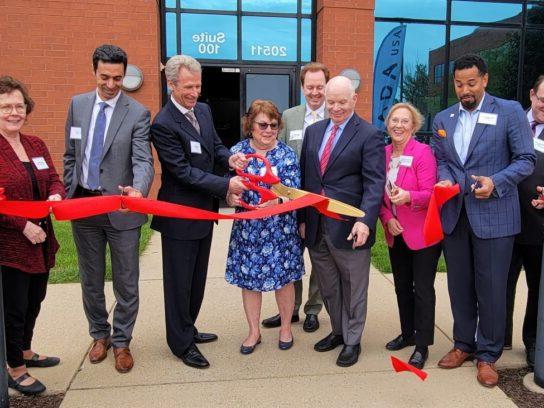 photo of officials celebrating ribbon cutting for RADA USA expansion